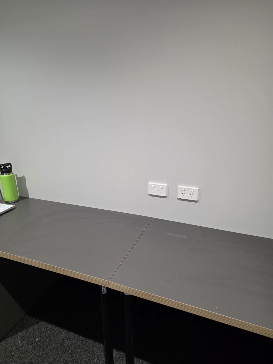 Twin double power points installed above office desks