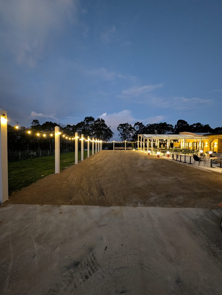After: festoon walkway lit at dusk